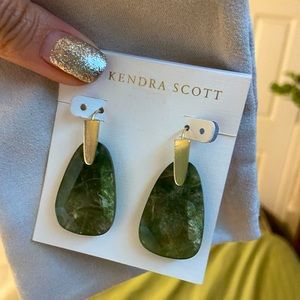 Kendra Scott drop earring in dark green.